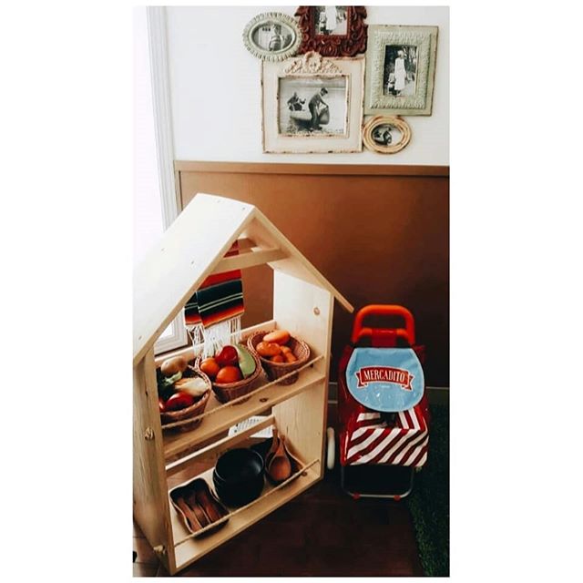 House-shaped shelf with play food